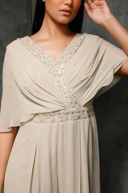 Asymmetrical Neckline with Pleated Detail